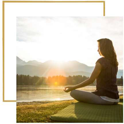 woman-meditating-by-lake-square-element-1